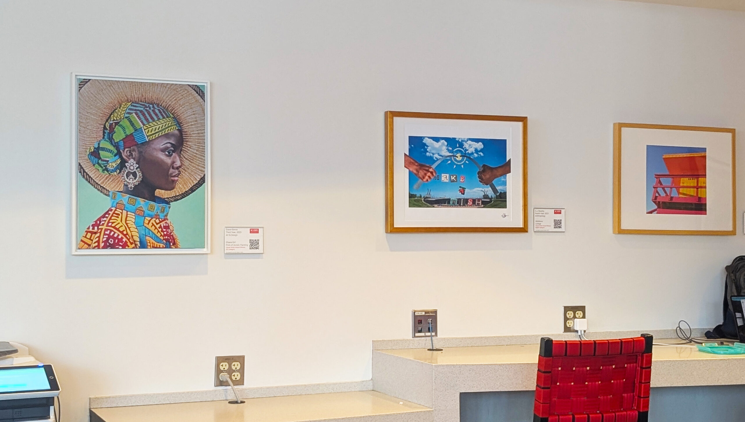 Art hanging on a wall in Talley Student Center.